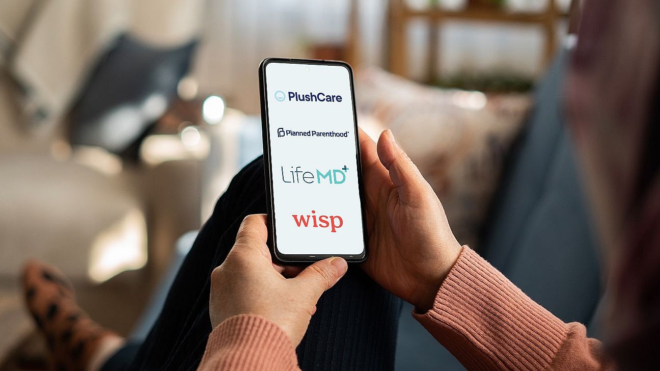 Phone with STI treatment service logos